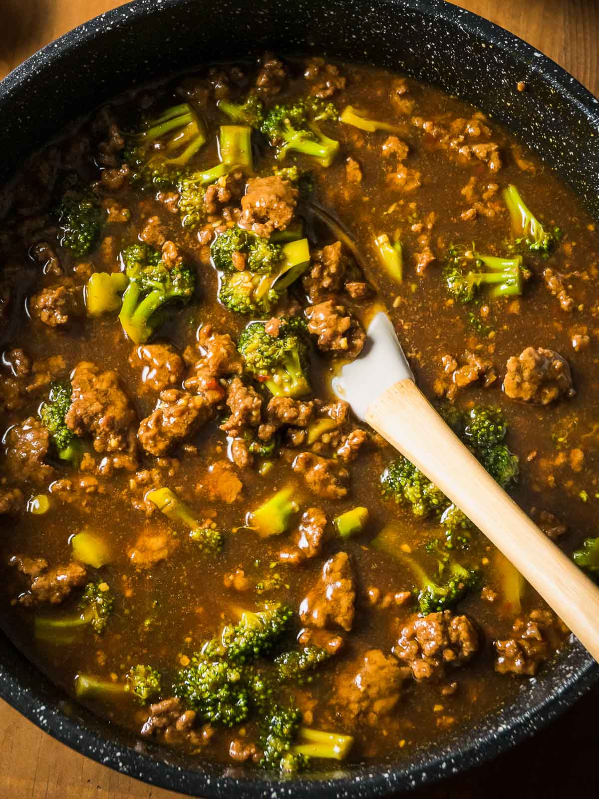 Asian Ground Beef and Broccoli simmers in a skillet.