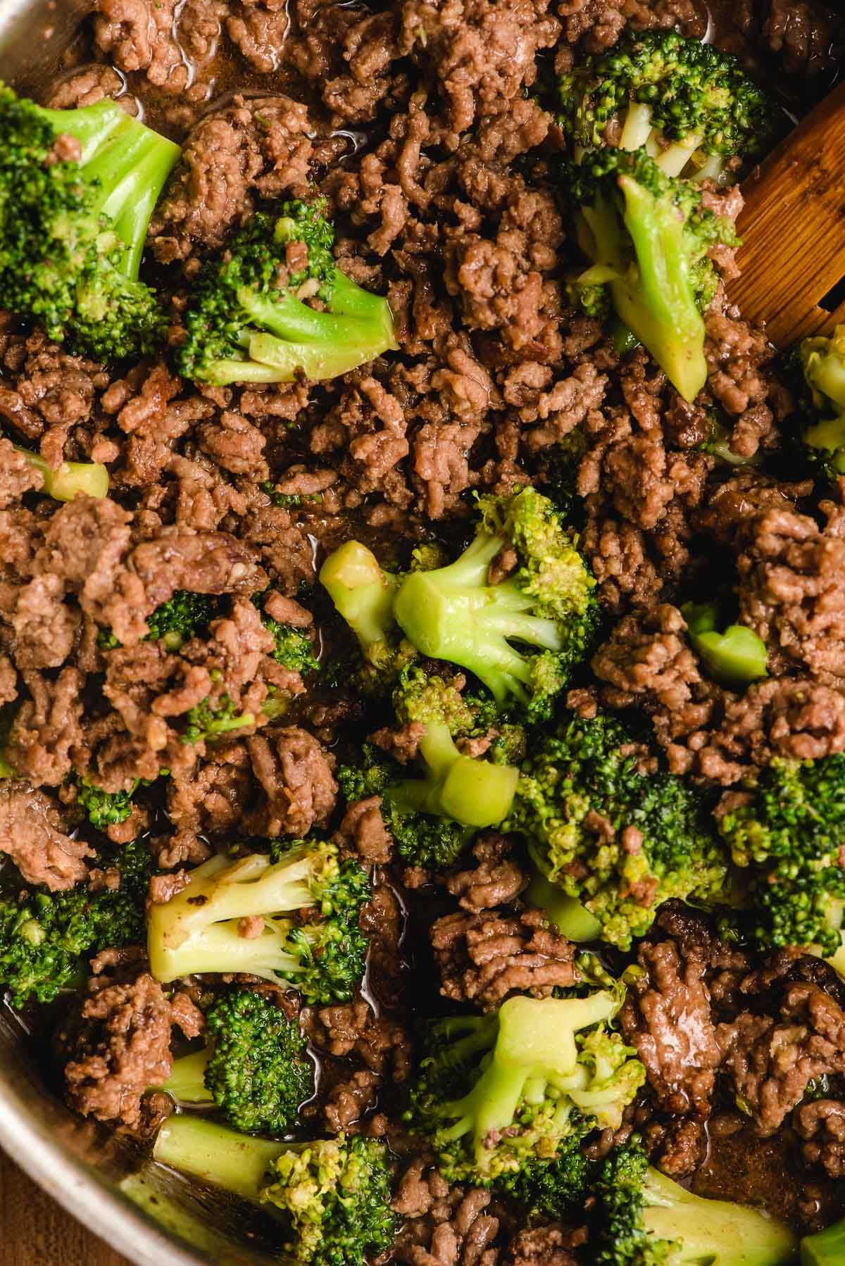 Close up image of ground beef and broccoli.