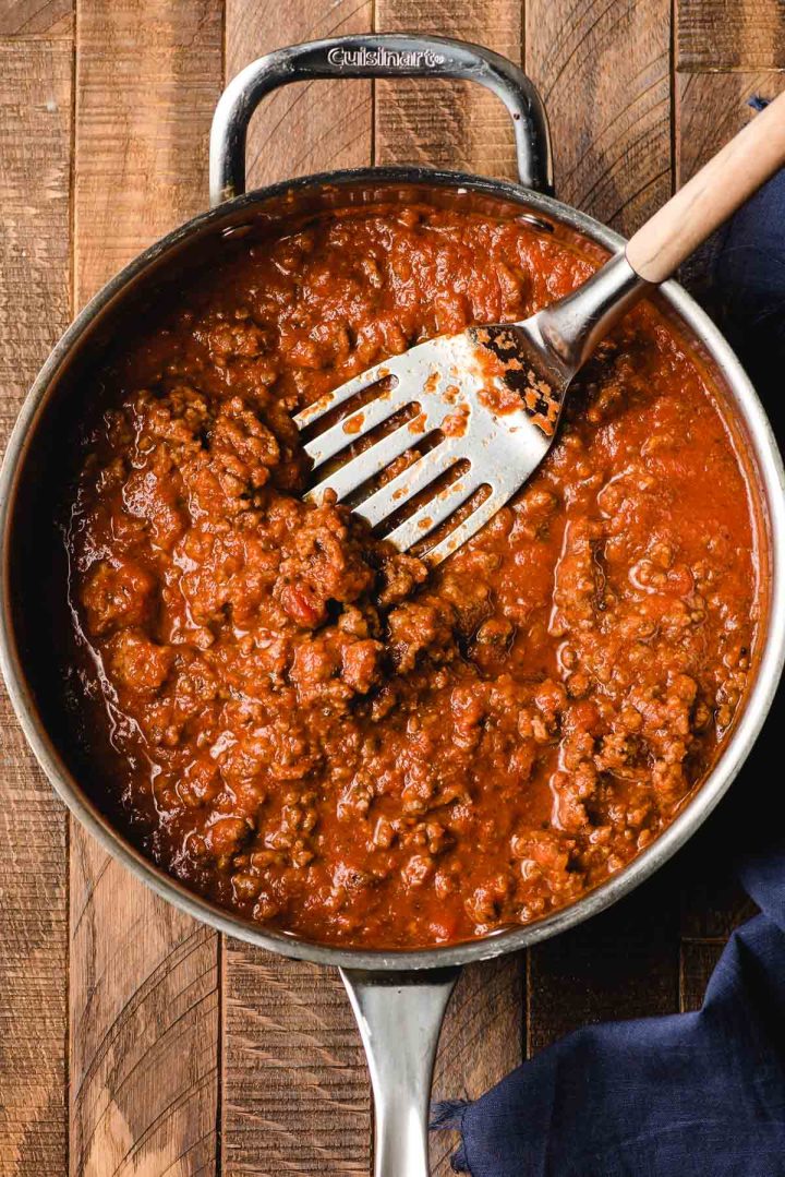 Ground beef and tomato sauce in a pan.