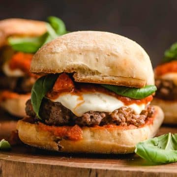 Italian Burger sits on a serving board.