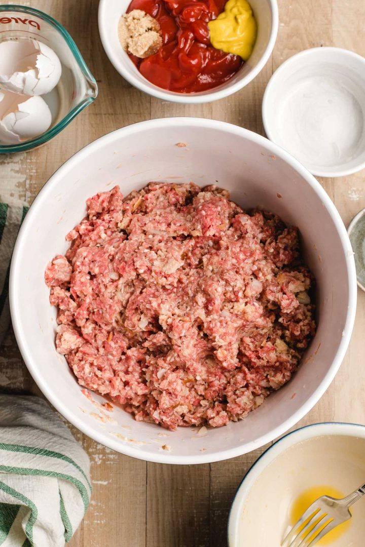 Raw meatloaf in a bowl.