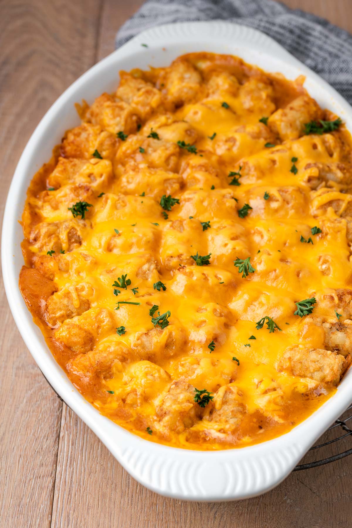 A baked Cheeseburger Tater Tot Casserole dish on a table.