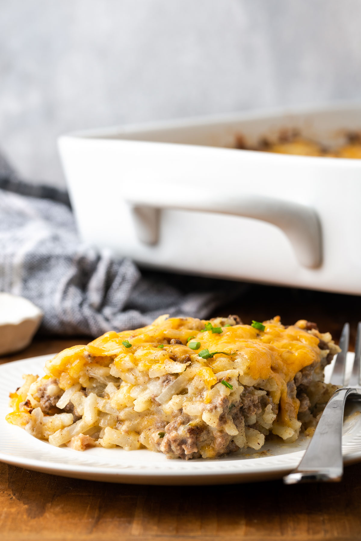 Plated slice of ground beef hash brown casserole.
