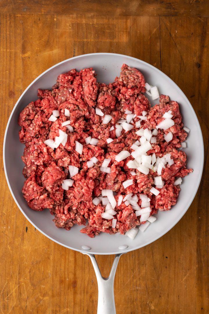 Ground beef and onions together in a saute pan.