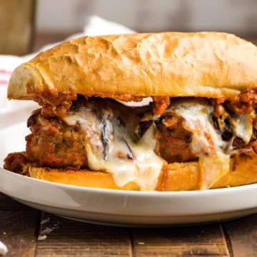 Cheesy Meatball Subs served.