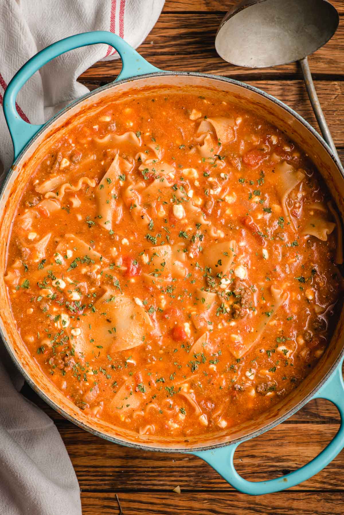 Dutch oven filled with lasagna soup.